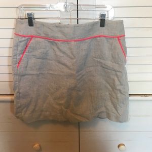 Size 10. Cream color w/ hot pink piping.